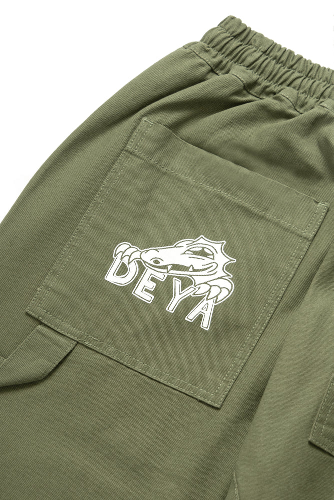 DEYA x Service Works Olive Green FOH Pants - DEYA logo close up