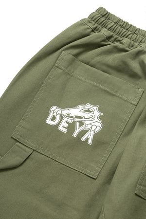 DEYA x Service Works Olive Green FOH Pants - DEYA logo close up